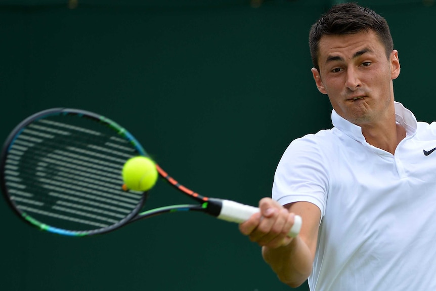 Bernard Tomic forehands at Wimbledon