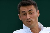 Bernard Tomic forehands at Wimbledon