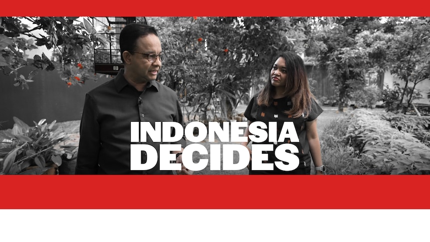 A woman listens as a man speaks. Text reads: Indonesia Decides.