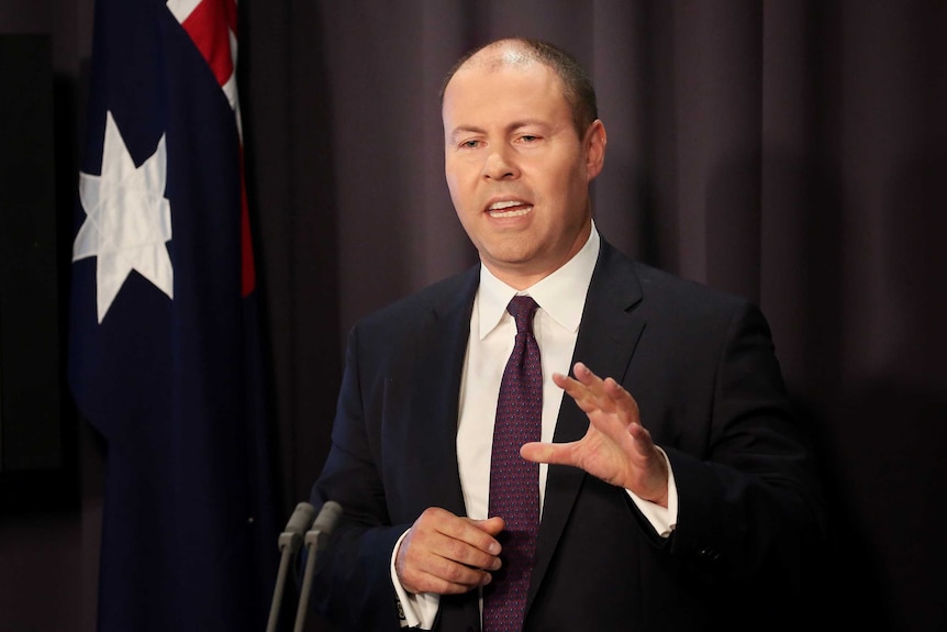 A close up of Josh Frydenberg speaking