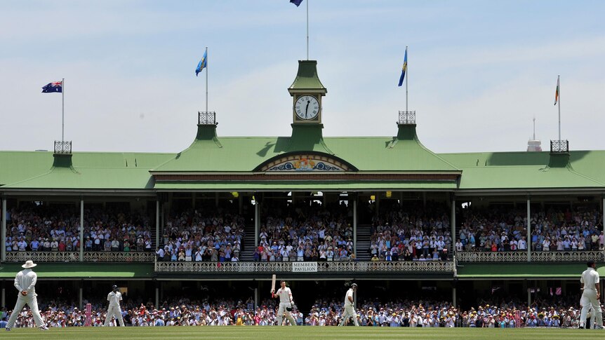 Michael Clarke acknowledges the crowd after reaching a century at the SCG.