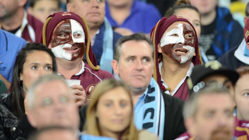 Watch and learn ... some brave Maroons infiltrate enemy territory at the Olympic stadium.