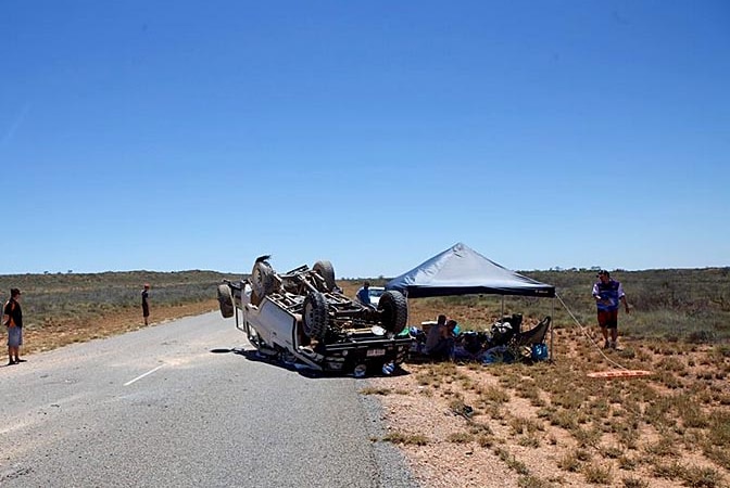 A 4WD lies on its roof after crashing near Exmouth in northern Western Australia.
