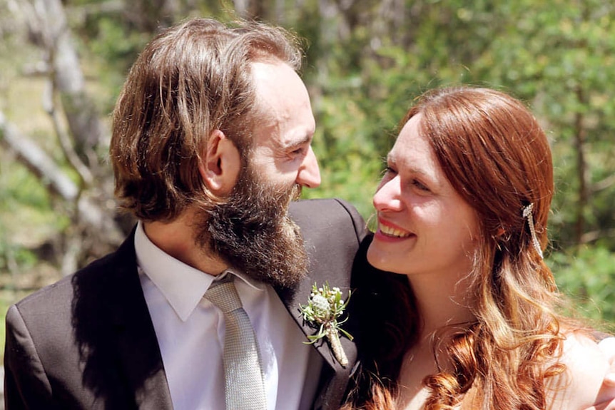 Max Atkins and Libby Carr on their wedding day to depict options for your surname after the wedding.