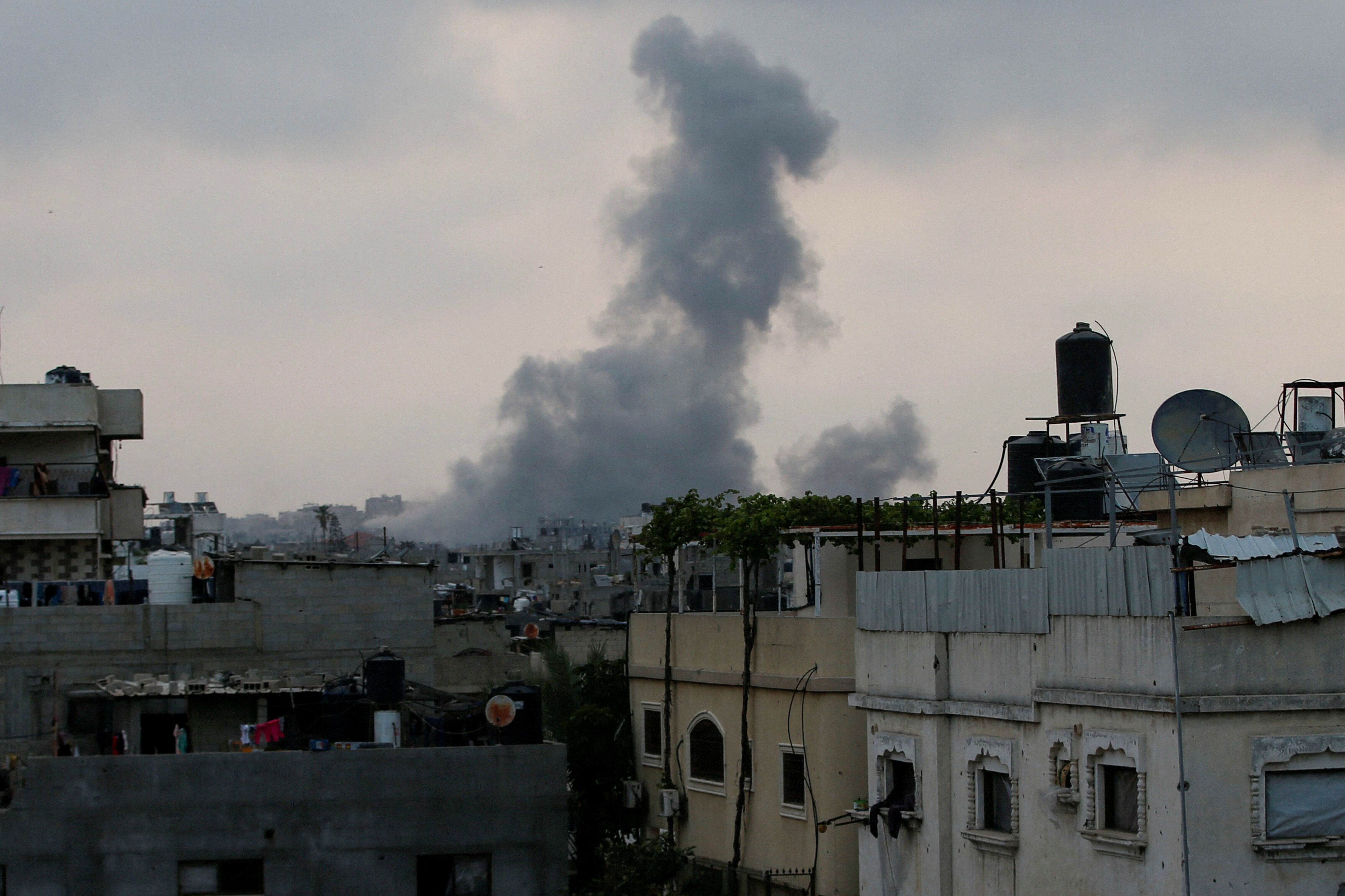 Smoke rises following Israeli strikes over the Gaza skyline.