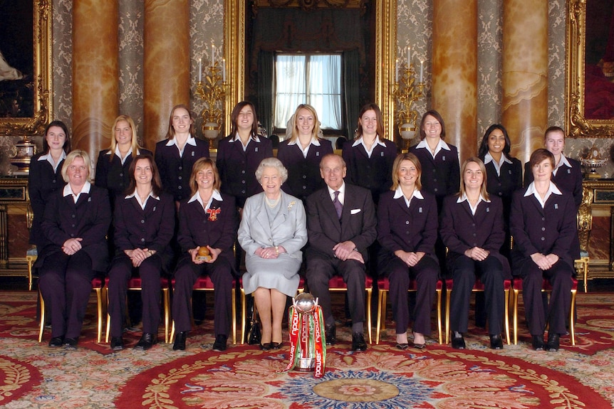 England's women's Ashes team poses for a group photo in Buckingham Palace with the Queen and Prince Philip.