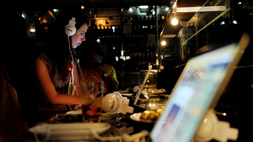 Woman listens to a digital radio station