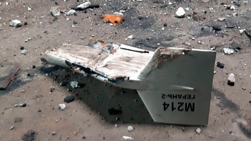 Drone wreckage is seen on the ground in Ukraine.