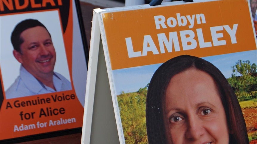 Candidates for the seat of Araluen outside the Alice Springs Electoral Office