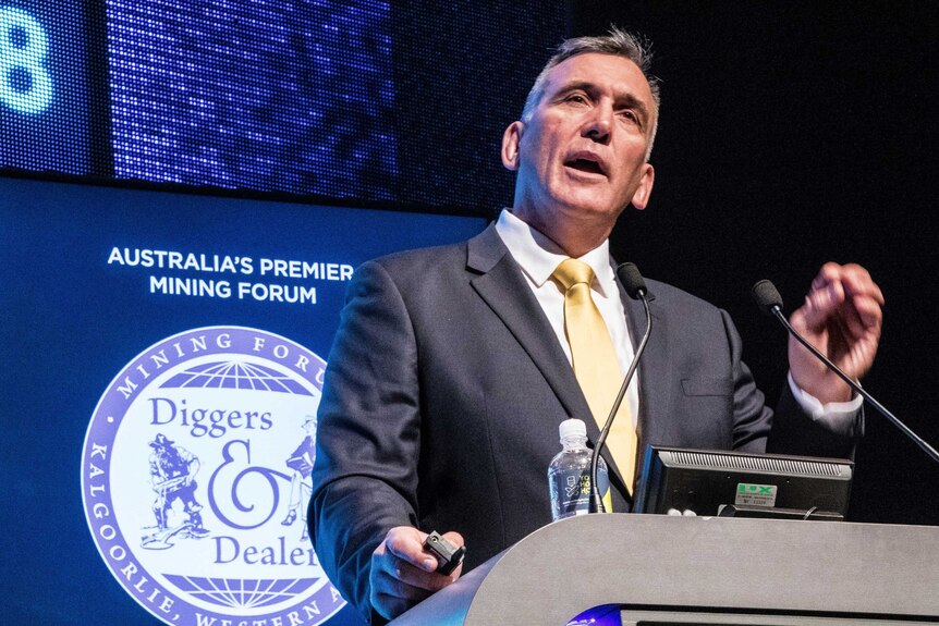 Mining boss speaking at conference