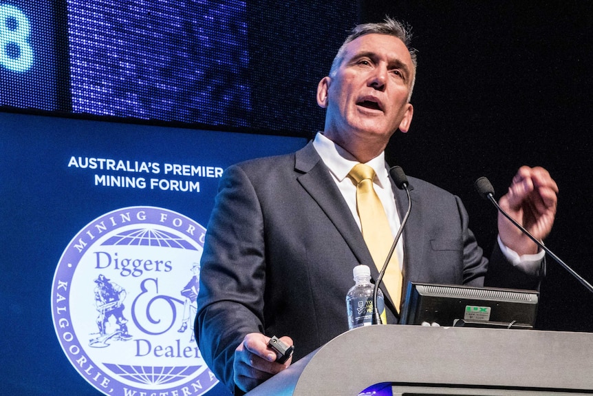 Mining boss speaking at conference