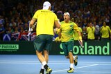 Lleyton Hewitt celebrates a point with Sam Groth in the Davis Cup