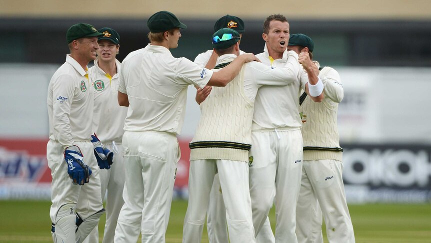 Siddle celebrates after dismissing Jonathan Trott in first Ashes Test