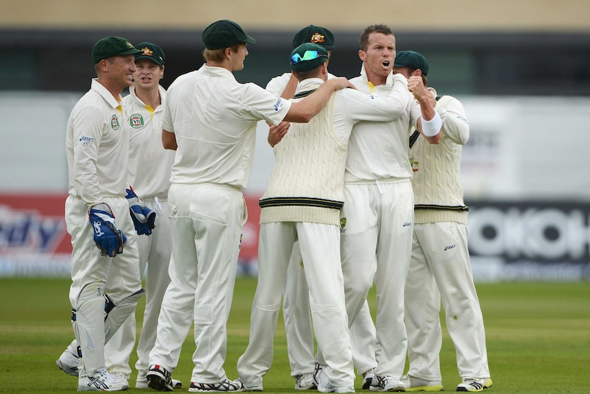 Siddle celebrates after dismissing Jonathan Trott in first Ashes Test