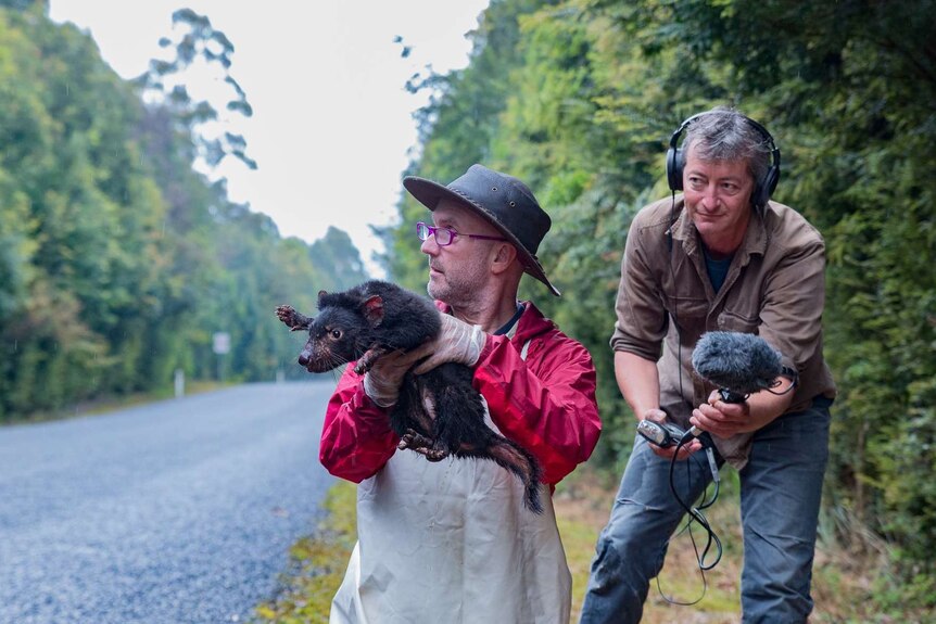 Channing Hughes of the Carnivore Conservancy holds a Tasmanian devil