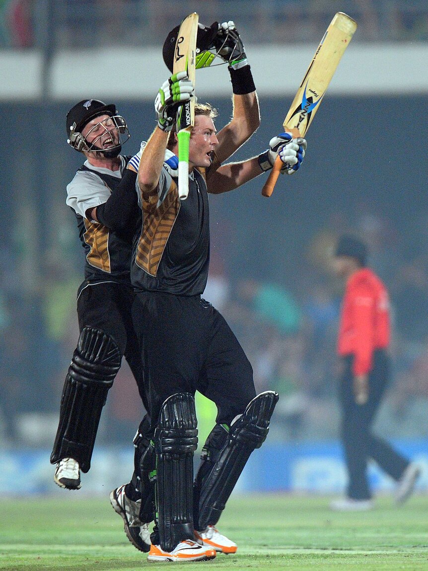 New Zealand's Martin Guptill celebrates after smashing home the winning runs.