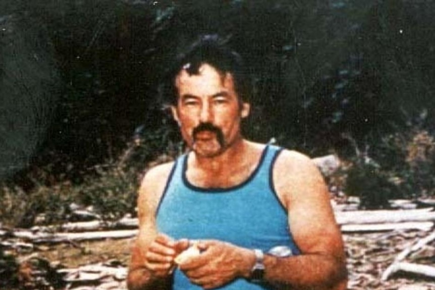 An older photo of Ivan Milat smiling at the camera.