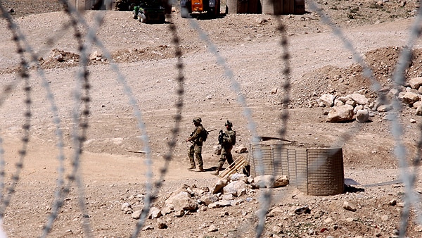Soldiers seen through the wire in Afghanistan (Scott Ludlam)