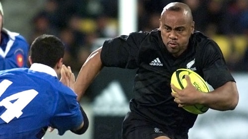 Rugby player running with ball