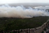 Smoke is seen covering the area