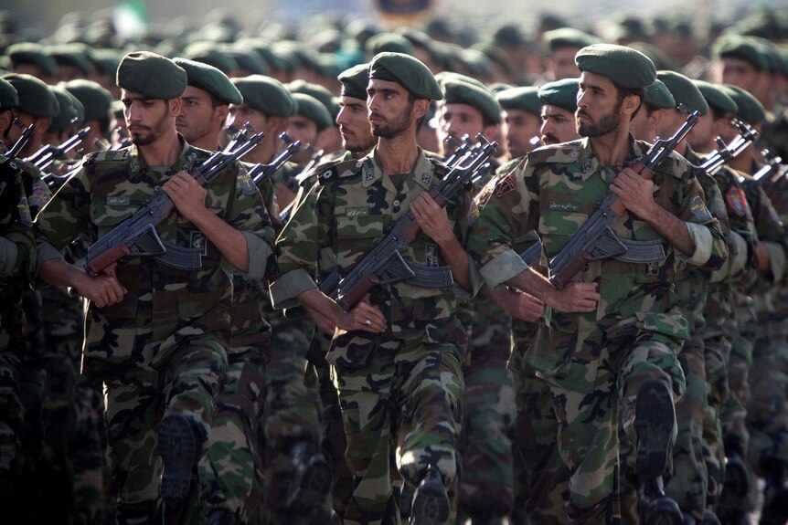 Members of Iran's Revolutionary Guards march during a military parade