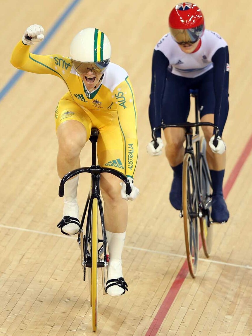 Anna Meares celebrates winning the gold medal in the women's sprint ahead of Victoria Pendleton.