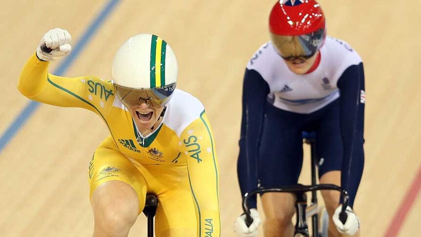 Anna Meares celebrates winning the gold medal in the women's sprint ahead of Victoria Pendleton.