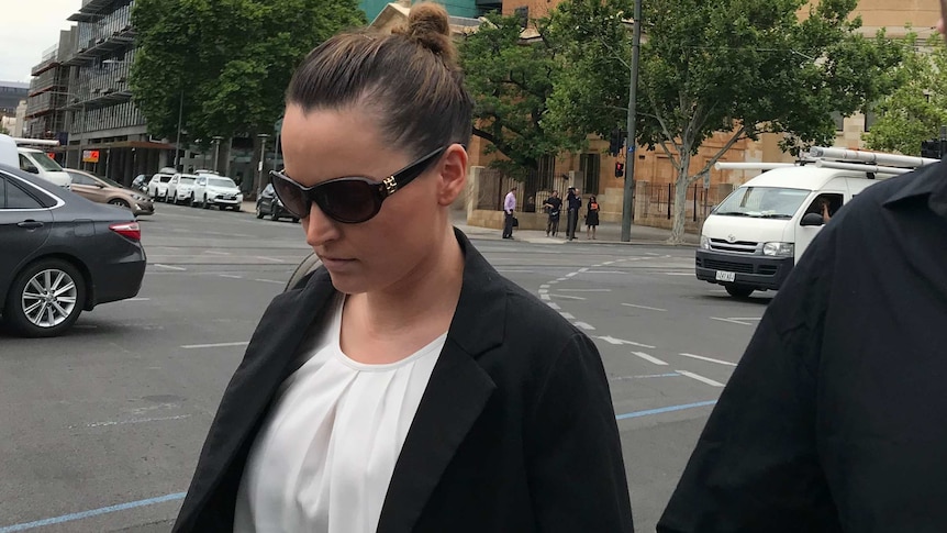 Jessica Cutting walks from the Adelaide coroners court