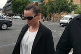 Jessica Cutting walks from the Adelaide coroners court