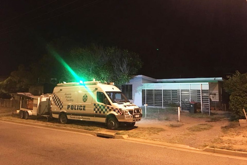 Police vehicle outside the home of Clare Alexa Wilson, then aged 92, at night in Mount Isa in April 2018