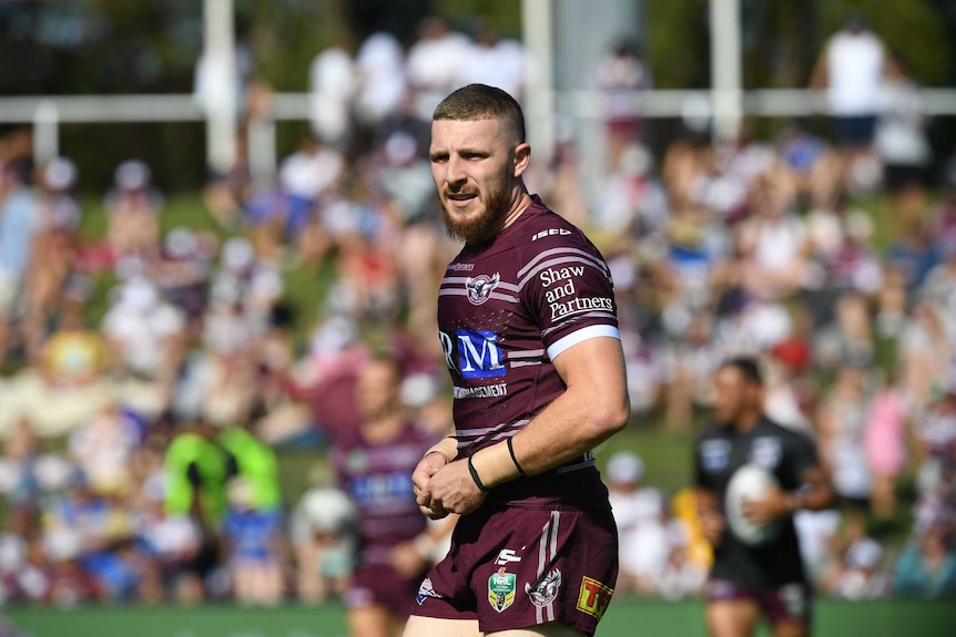 Manly player Jackson Hastings warms up at Brookvale Oval