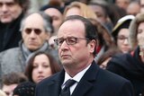 French Paris' mayor Anne Hidalgo (L), French President Francois Hollande (C) and French Prime minister Manuel Valls (R), attend a remembrance rally