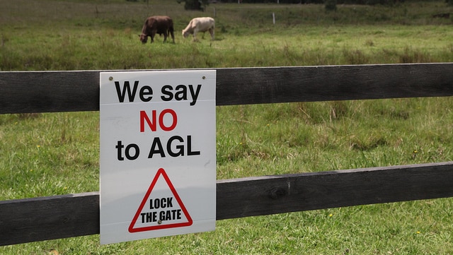 A "no to AGL" sign on a farm fence in the Hunter Valley region.