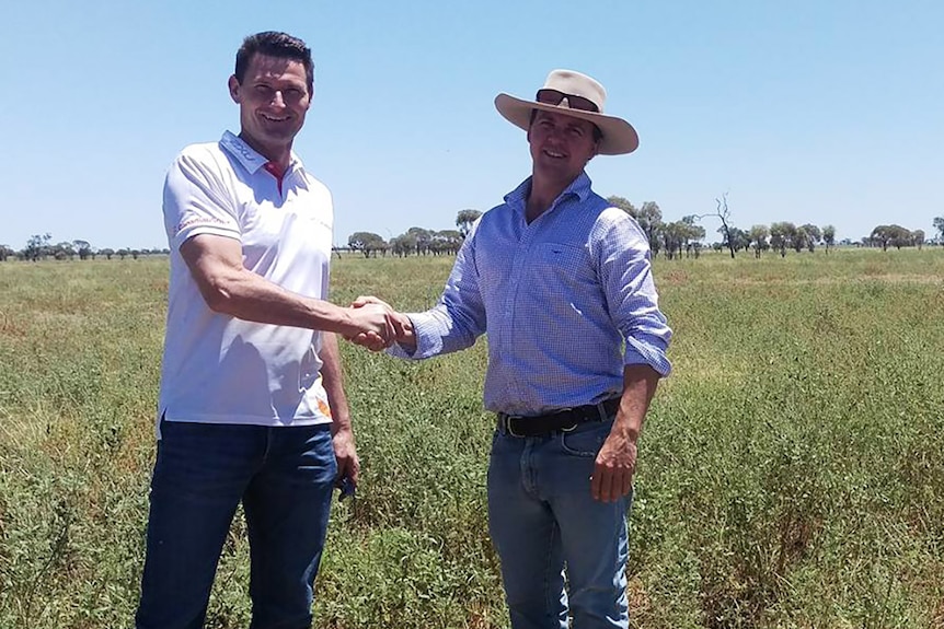 Longreach Solar's Daniel Rouss with local grazier James Walker