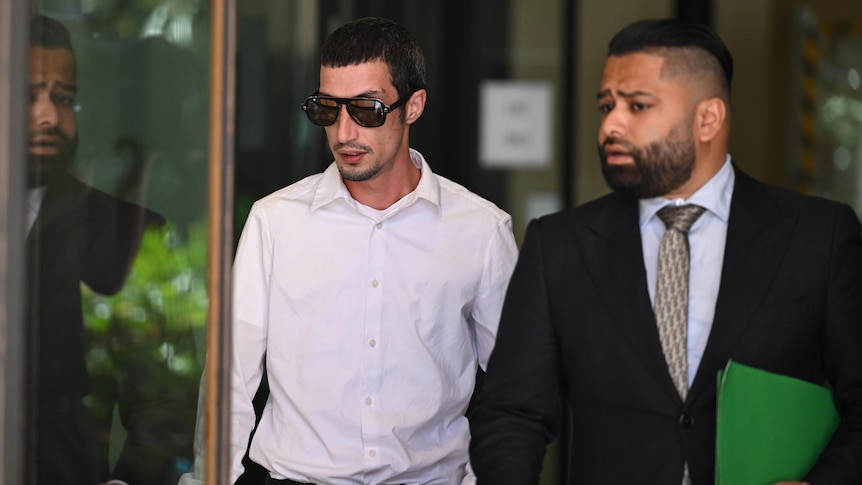 Two men, one lawyer Upol Amin, the other client Ryan Marshall leave Sydney Downing Centre