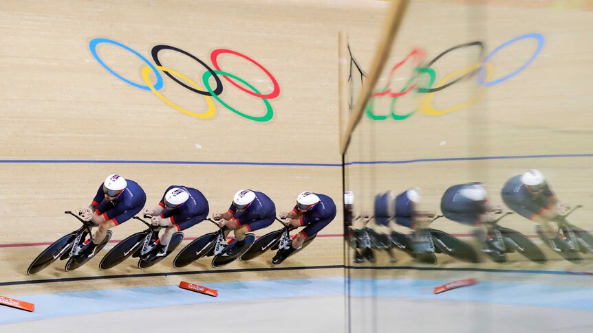 Great Britain team rides in men's team pursuit