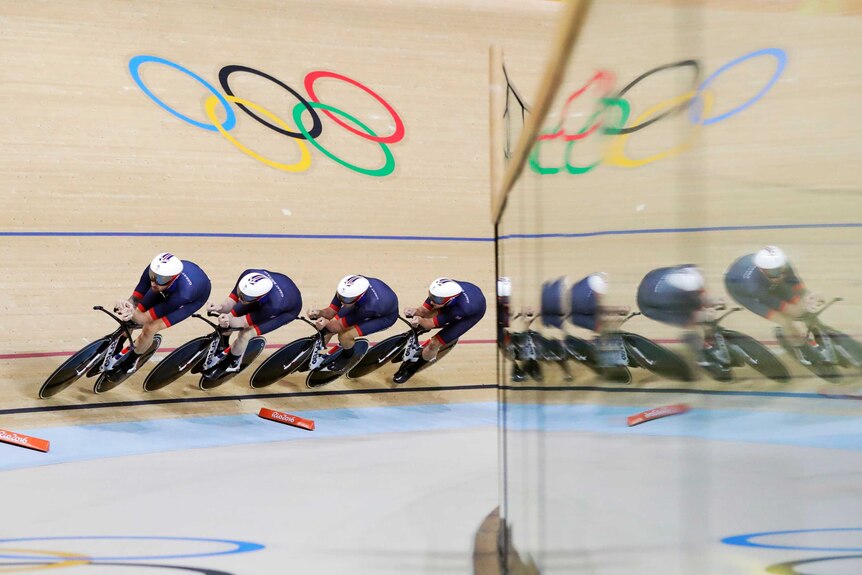 Great Britain team rides in men's team pursuit