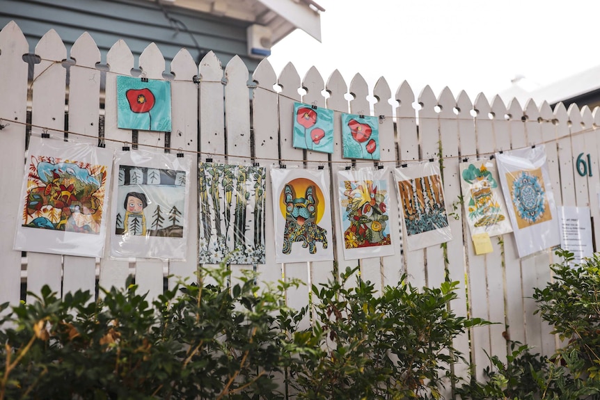 Annica Malkvist's art sold from her front fence.