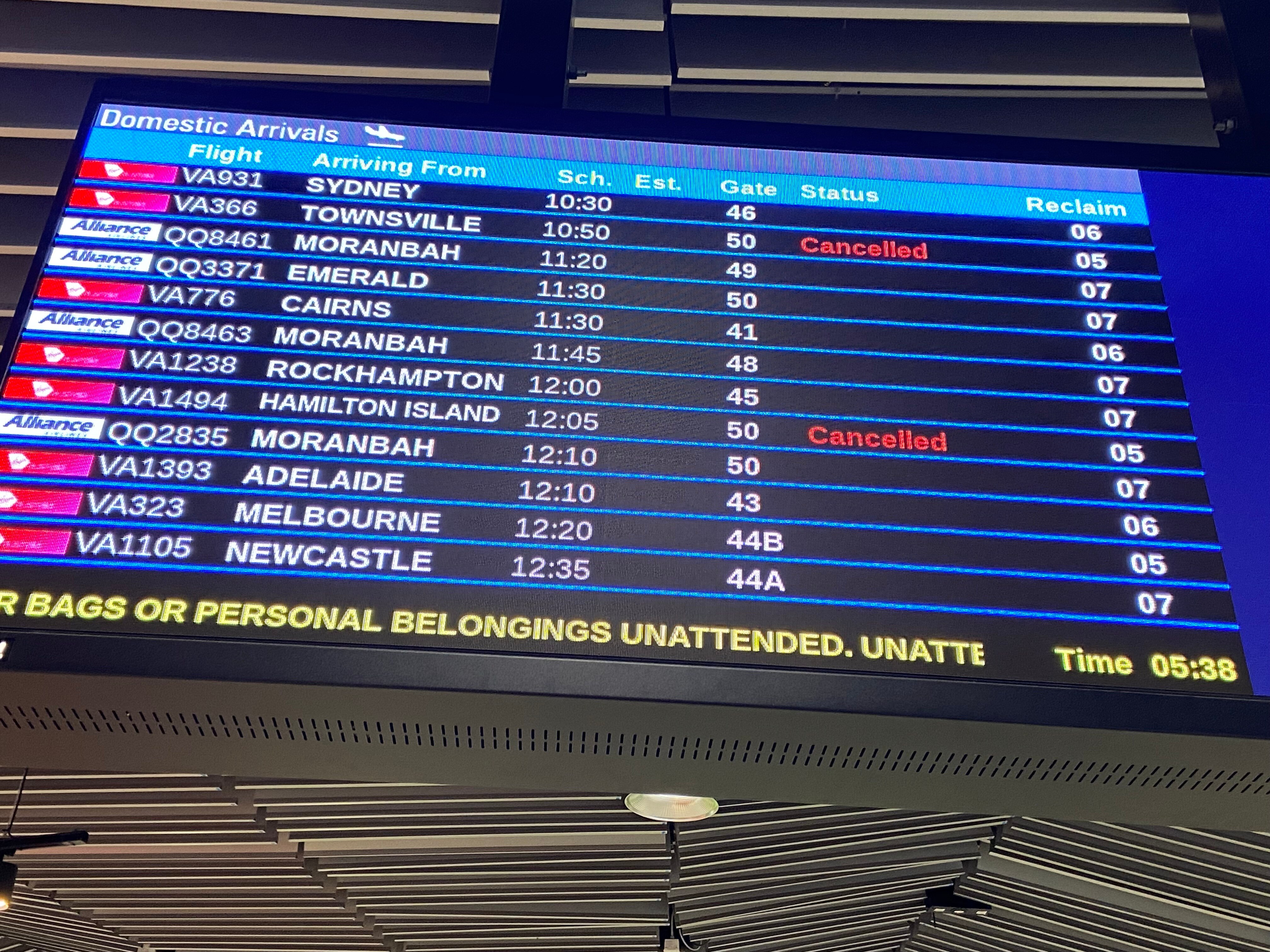 Airport destination board showing flights cancelled