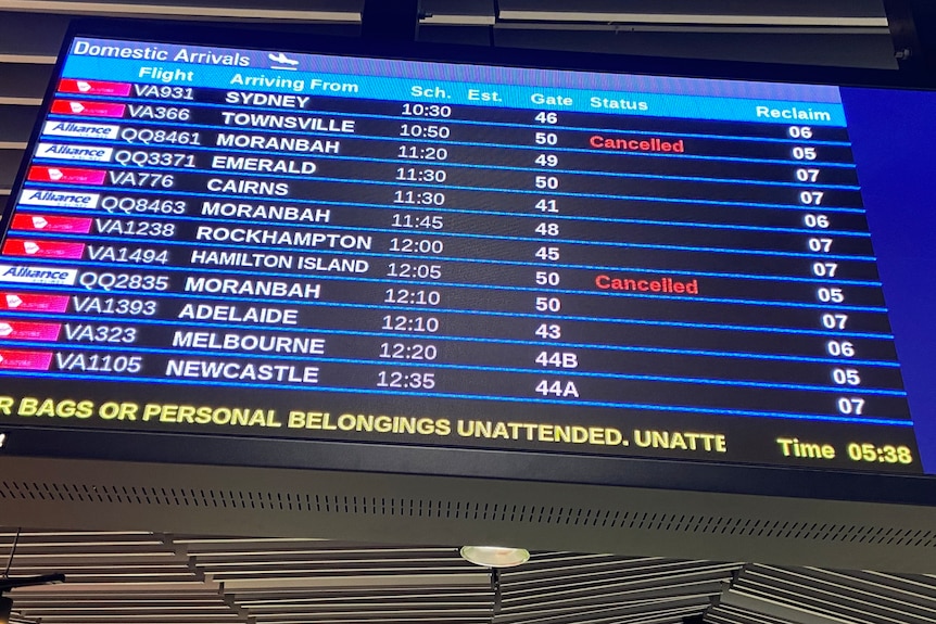 Airport destination board showing flights cancelled