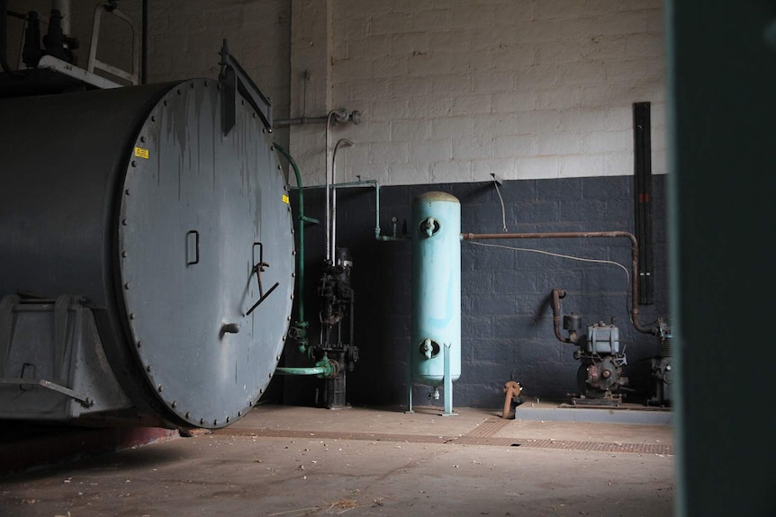 A photo of ageing engineering equipment in the steam pump house.