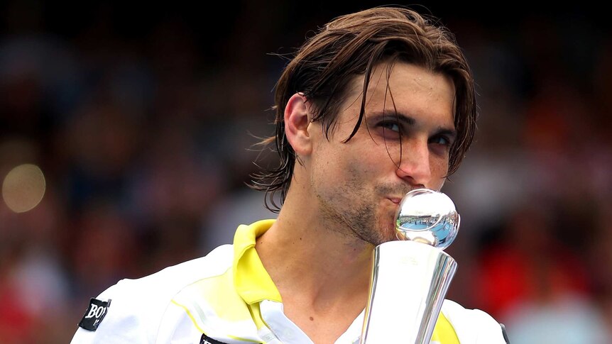 David Ferrer holds the Auckland Open trophy after he beat Philipp Kohlschreiber in the final.