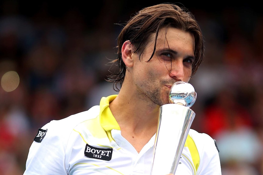 David Ferrer holds the Auckland Open trophy after he beat Philipp Kohlschreiber in the final.