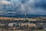 Snowy skies over Parliament House in Canberra.