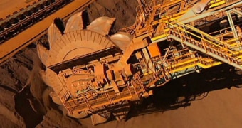 Machine loads iron ore