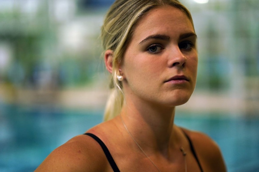 A close portrait of Shayna Jack poolside