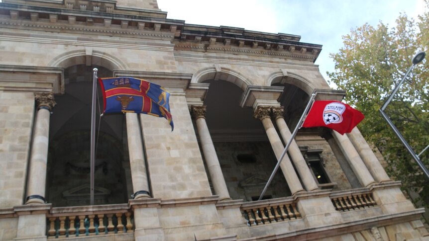 The Adelaide United flag flies at Adelaide Town Hall.