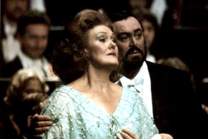 Joan Sutherland and Luciano Pavarotti sing during a concert, Sydney Opera House concert hall, 1983