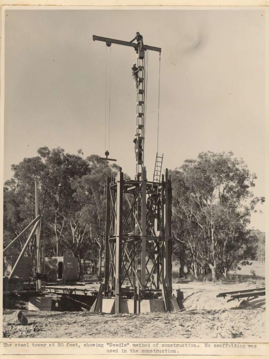 A small crane pictured inside the steel framework for the Australian-American memorial.