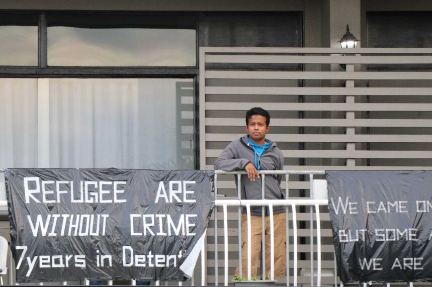 detainee stands on the balcony of the Kangaroo Point detention centre